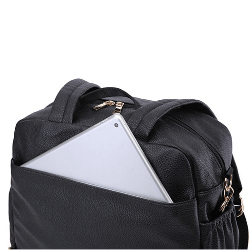A Lily - Black backpack with a laptop in it.
