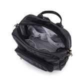 The inside of a Lily - Black backpack by Mother and Baby with two compartments.