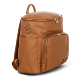 An Ava - Caramel leather backpack with a zippered compartment by Mother and Baby.