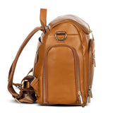 A Chloe - Caramel leather backpack with a zippered compartment, made by Mother and Baby.