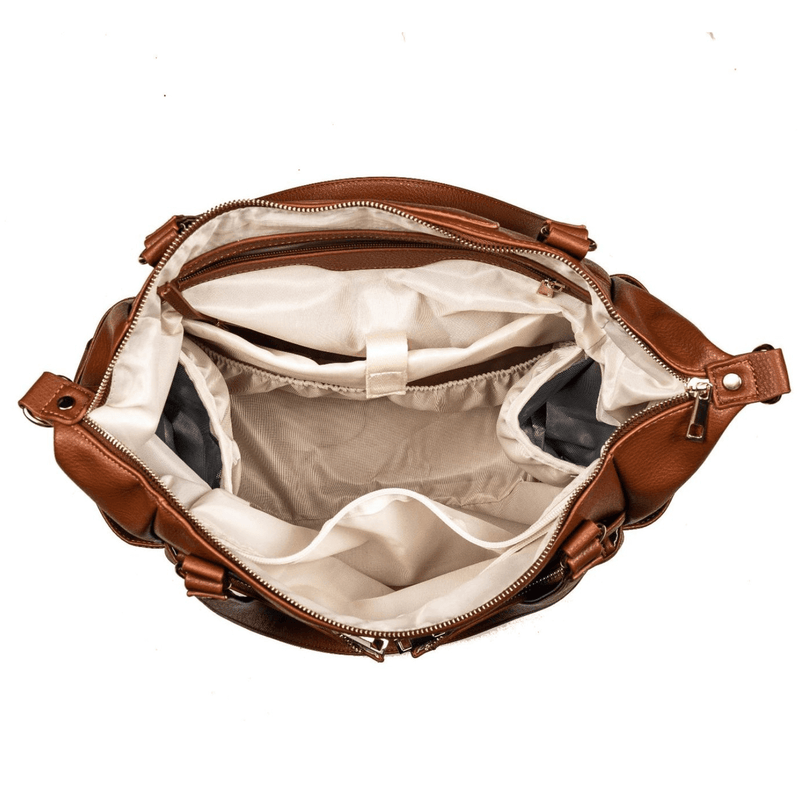 The inside of an Ivy - Caramel handbag from Mother and Baby.