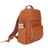 An Olivia - Caramel leather backpack with a tassel from Mother and Baby.