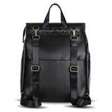 A Scarlett - Black backpack with straps and buckles by Mother and Baby.