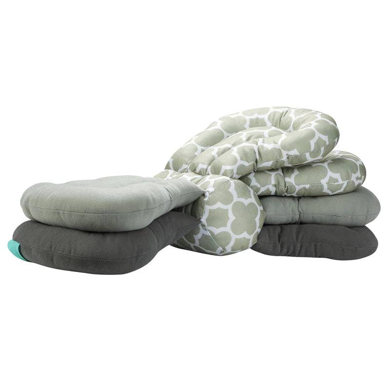 A stack of Mother and Baby Adjustable Breast Feeding Pillows stacked on top of each other.