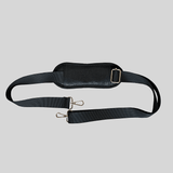 A Mother and Baby black leather strap with a metal buckle.